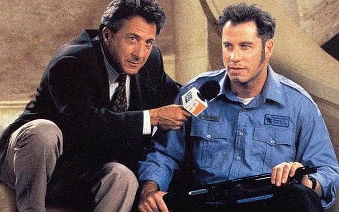 Dustin Hoffman a John Travolta (Město šílenců)